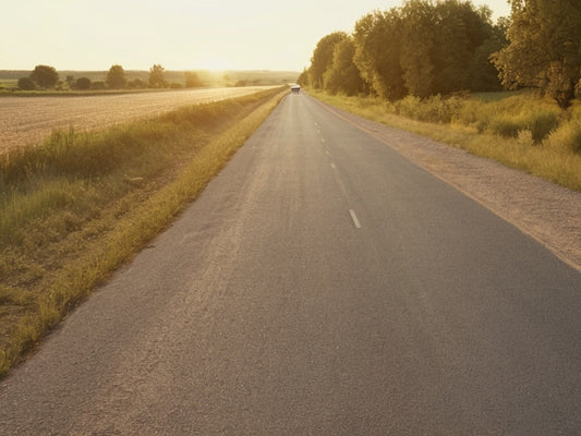 Empty rural highway at golden hour