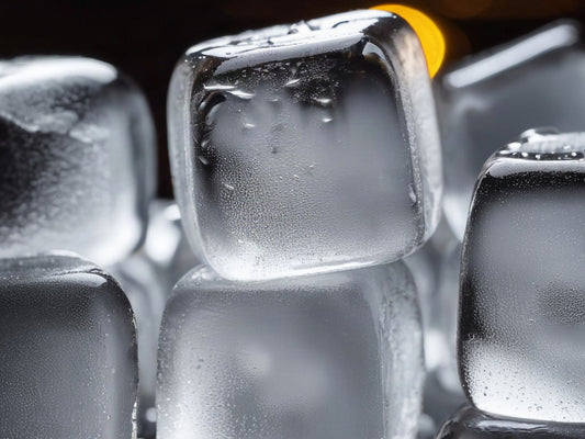 Close-up of ice cubes in a bar ice well